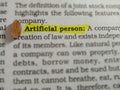 artificial person bussiness related terminology displayed on book article Royalty Free Stock Photo