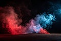 Artificial smoke in red-blue light on black background Royalty Free Stock Photo