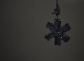 Artificial snowflake in the evening in the room