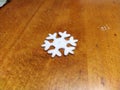 Artificial snowflake on the table