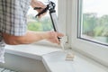 Artificial stone window sill, installation, technological process. Royalty Free Stock Photo