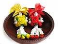 Artificial Thai garlands made of clay, in a wooden tray, crafted Royalty Free Stock Photo