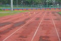 Artificial track and field with green grass combined with artificial grass Royalty Free Stock Photo