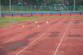 Artificial track and field with green grass combined with artificial grass Royalty Free Stock Photo