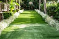 artificial turf aisle at a garden wedding Royalty Free Stock Photo