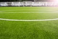 Artificial turf football field green white grid