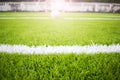 Artificial turf football field green white grid