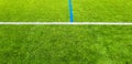 Artificial turf football pitch with white line outside vertically