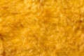 Yellow vintage fur artificial fur pattern background. Royalty Free Stock Photo