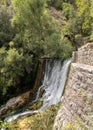 Sant`Angelo a Fasanella. View of the crossbar of the ancient power plant. Artificial waterfall at the sources of the Auso Royalty Free Stock Photo