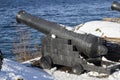 artileriyskoe instrument of the 19th century, standing on the slope of the shore batteries