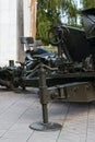 Artillery, gun mechanism controls, green artillery cannon close - up in the park, anti-tank guns during World War II