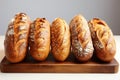 Artisan baguettes on display against a clean, white setting