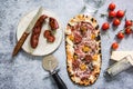 artisan baked pizza with ingredients Royalty Free Stock Photo