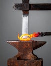 Artisan Blacksmith Forging Hot Metal on Anvil Royalty Free Stock Photo