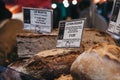 Artisan bread on sale at Oliviers Bakery stall in Borough Market, London, UK