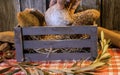 Artisan breads in a wooden box with wooden background Royalty Free Stock Photo