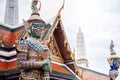 Artisan ceramic facade and giant guardian statue of Bangkok Gran