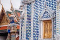 Artisan ceramic facade and giant guardian statue of Bangkok Gran