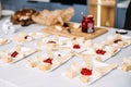 Artisan Cheese Tasting Setup with Accompaniments. A cheese tasting arrangement featuring a variety of artisan cheeses Royalty Free Stock Photo