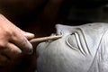 An artisan creating head of clay idol Royalty Free Stock Photo