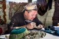 Artisan fabrication of ancient military armor in Asia