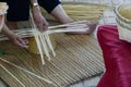 Artisan is making rattan basketry handcraft