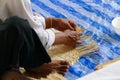 Artisan is making rattan basketry handcraft