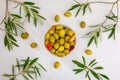 Artisan olives canned in extra virgin olive oil, vinegar, spices with red peppers and garlic. Royalty Free Stock Photo