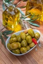 Artisan olives canned in extra virgin olive oil, vinegar, spices with red peppers and garlic. Royalty Free Stock Photo