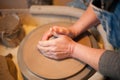 Artisan Potter throwing a pot Royalty Free Stock Photo