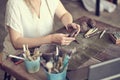 artisan pottery tutor in art studio. woman ceramist teaches an online lesson or leads a video master class on creating