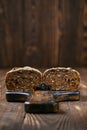 Artisan rye bread with dried apricots, prunes and seeds cut on half Royalty Free Stock Photo