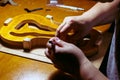 artisan violin maker luthier working on violin center bot, corner blocks , bend ribs for a new classic handmade violin