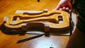 artisan violin maker luthier working on violin center bot, corner blocks , bend ribs for a new classic handmade violin