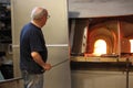 Artisan at work making glass sculpture