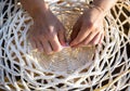 Artisan working on basketry, straw baskets. Traditional crafts. Handmade. AI Generative