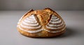Artisanal bread loaf with striped salt crust on a neutral surface Royalty Free Stock Photo