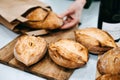 Artisanal Bread Loaves on Wooden Board. Slow foods. Home-cooked and authentic Bread