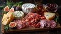 Artisanal cheese and salami platter with figs. Royalty Free Stock Photo