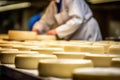 An artisanal cheesemaker creates a delicious dairy product