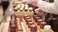 Artisanal Chocolate Assortment at Gourmet Shop with Customer