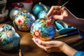 Artisanal Christmas: woman handcrafting balls