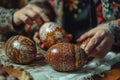 Artisanal hand-painted Easter eggs held by elderly hands showing traditional designs