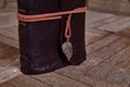 Artisanal Leather Journal with Pendant on Rustic Wood