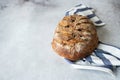 Artisanal sourdough bread with raisins on a napkin