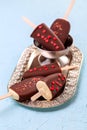 Homemade ice cream on a stick with chocolate icing Royalty Free Stock Photo