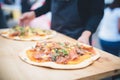 artisanal woodfired pizzas crafted at a food festival