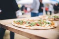 artisanal woodfired pizzas crafted at a food festival