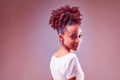 Artisitic red toned portrait of an attractive young Black woman